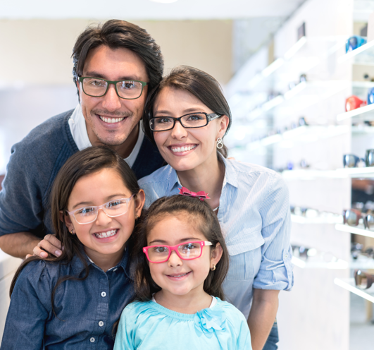 Happy family wearing glasses Professional Eye Care Center